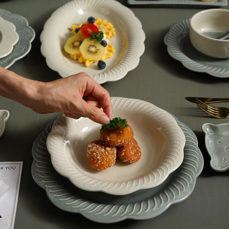 Ceramic-tableware-with-grayish-green-and-apricot-blossom-patterns