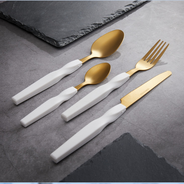 Mobius-strip-Stainless-steel-gold-flatware-set-with-twist-white-handle